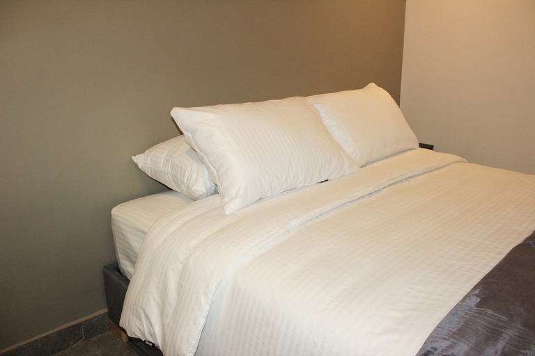 Habitación con cama Queen, a minutos del aeropuerto